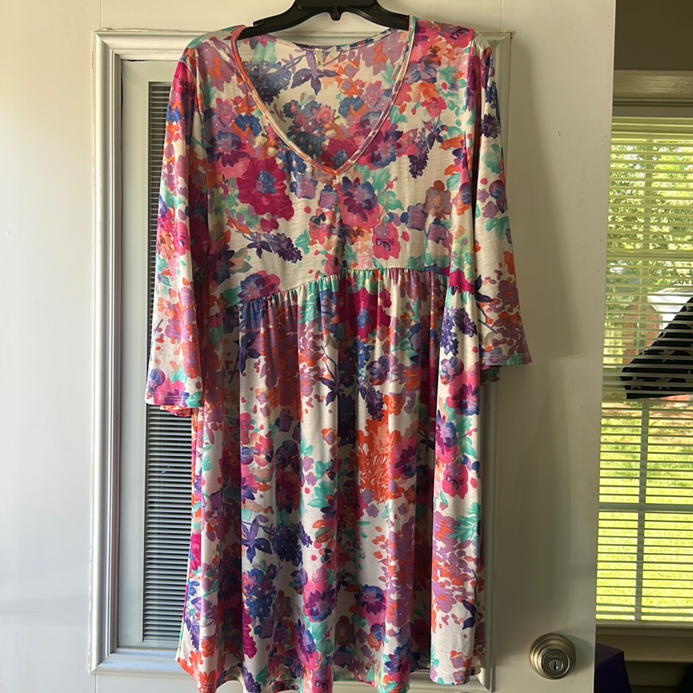 Bold floral pattern, baby doll fit, sheer lightweight dress
